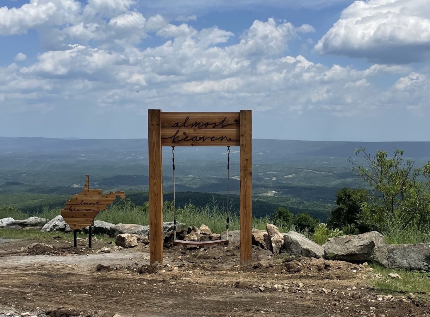 Almost Heaven swing at Cacapon Resort State Park with mountain views